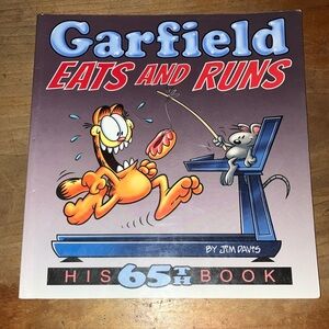Garfield eats and runs, his 65th book-  Book Volume 65
 by Jim Davis - softcover